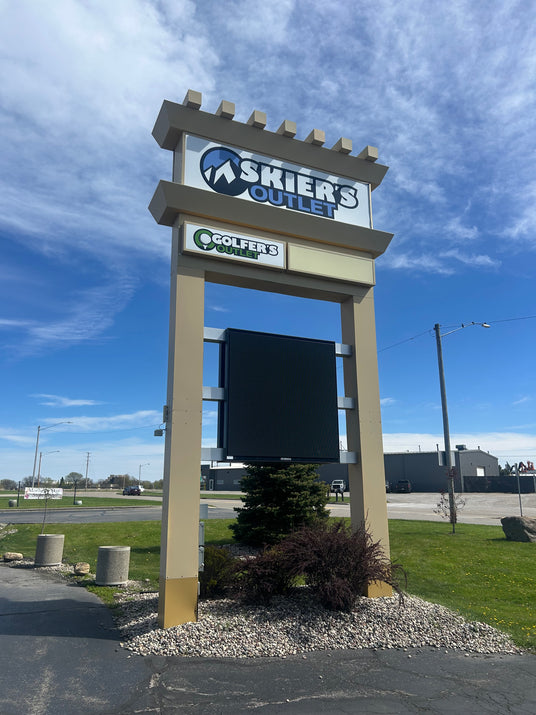 Exterior sign for our Oshkosh, WI shop; providing expert ski tuning, boot fitting, and golf club services in the Fox Valley.