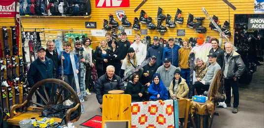 Our dedicated Oshkosh, WI team celebrating at a holiday party; meet the experts behind Wisconsin’s largest golf and ski shop.