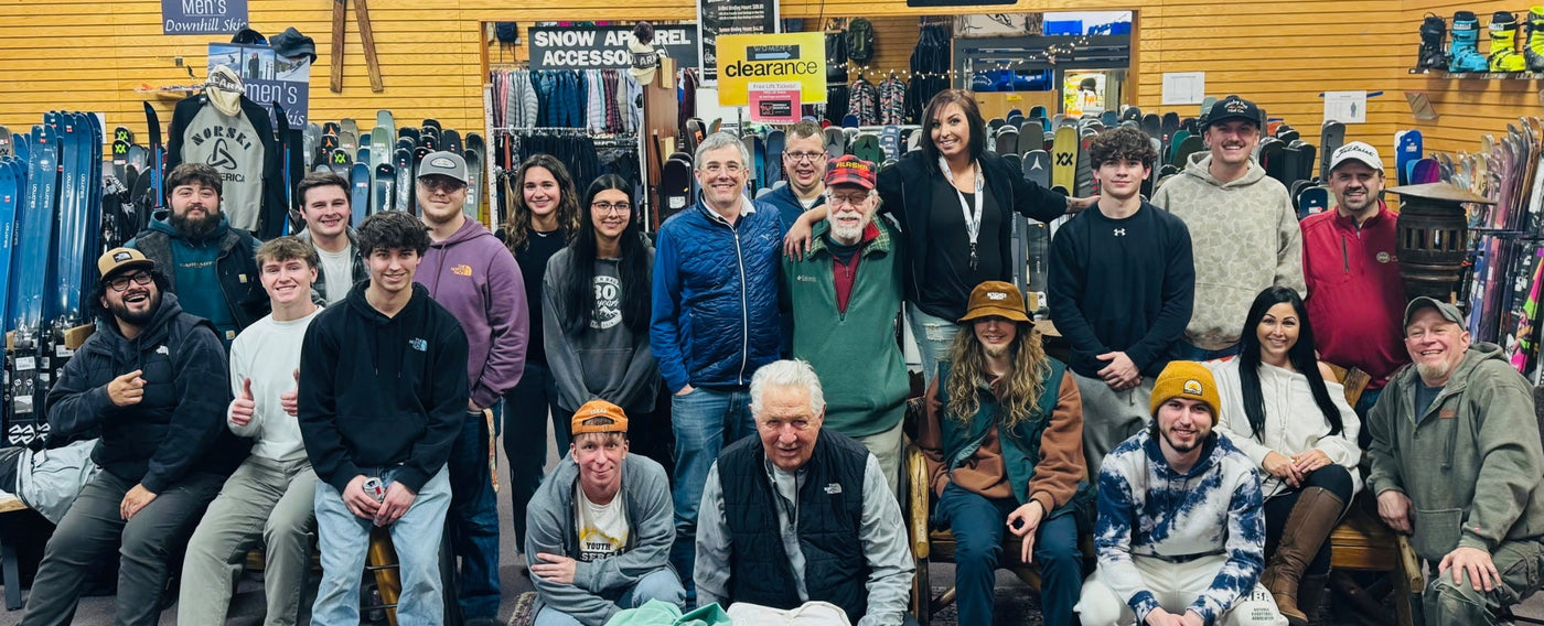 Team photo of the Golfer's & Skier's Outlet staff at a Christmas party in their Oshkosh, Wisconsin retail store.