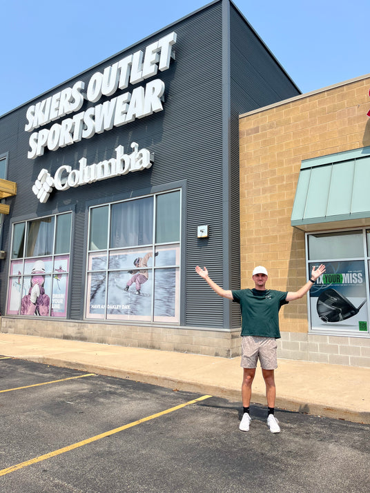 Marketing intern at the Skier’s Outlet and Sportswear storefront in Oshkosh, showcasing retail promotion and outreach.