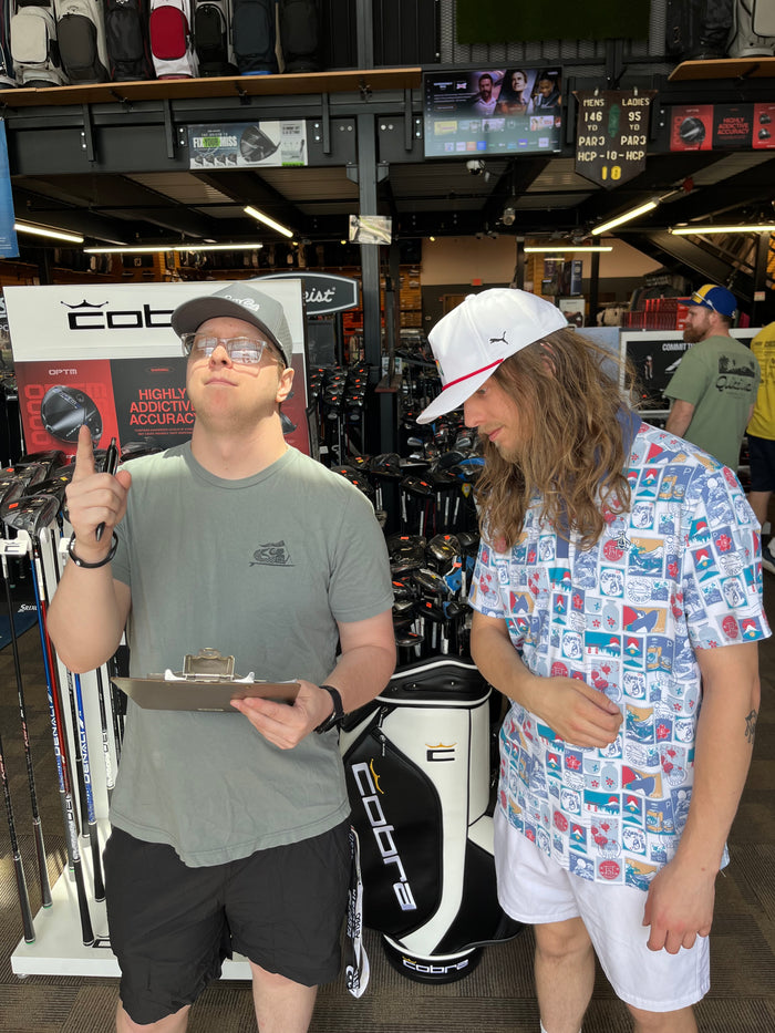 A Retail Manager at Golfer's & Skier's Outlet training staff and managing golf inventory in Oshkosh, Wisconsin.