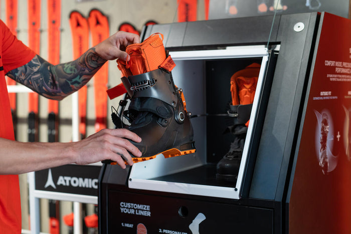 Expert custom ski boot shell heat molding to expand and shape the outer plastic for a perfect fit in Oshkosh, Wisconsin.