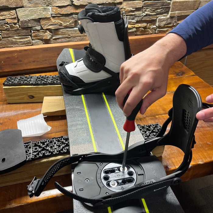 Expert snowboard binding mount and adjustment service for local riders at Golfer's & Skiers Outlet in Oshkosh, Wisconsin.